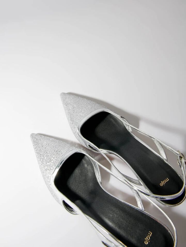 Pointed silver pumps