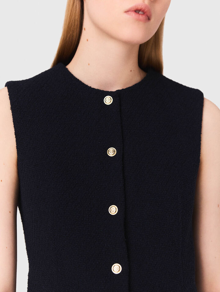 Long sleeveless tweed jacket
