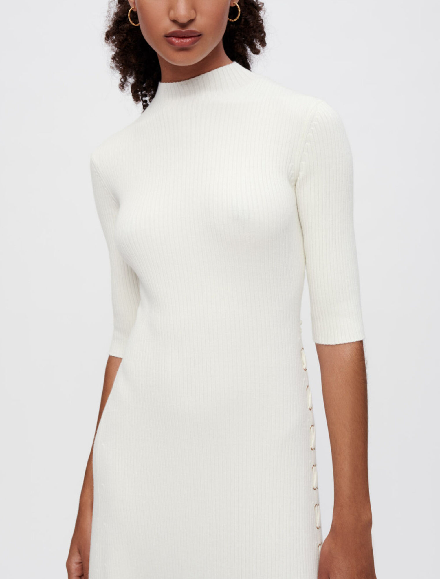 Ribbed knit dress with gold eyelets