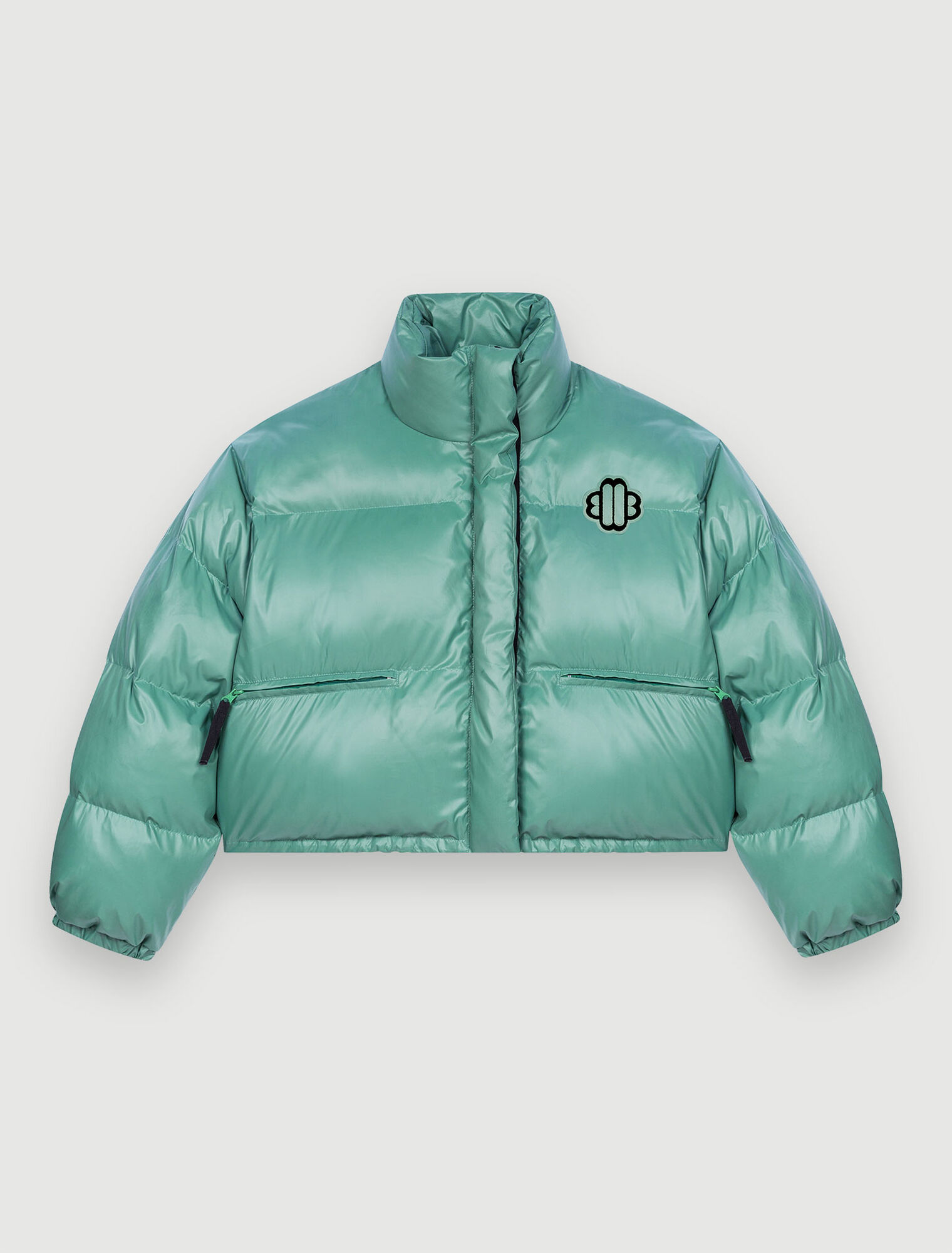 Green down jacket with Maje Clover patch