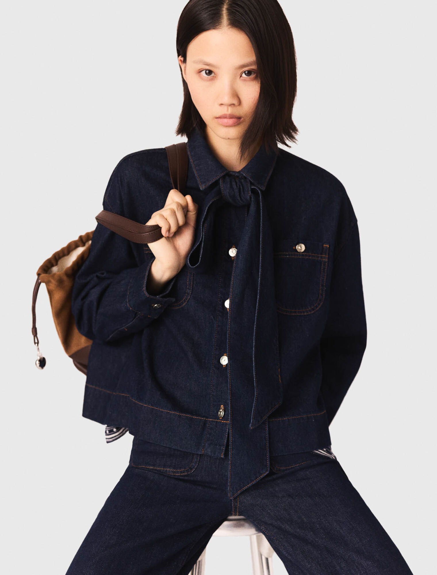 Denim shirt with pussy bow