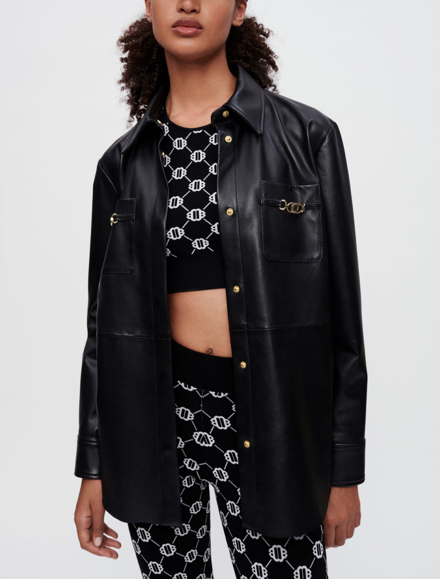 Black leather shirt with gold horsebits