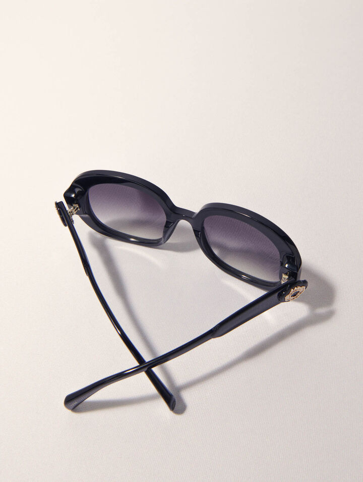 Round acetate glasses