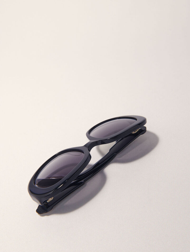 Round acetate glasses