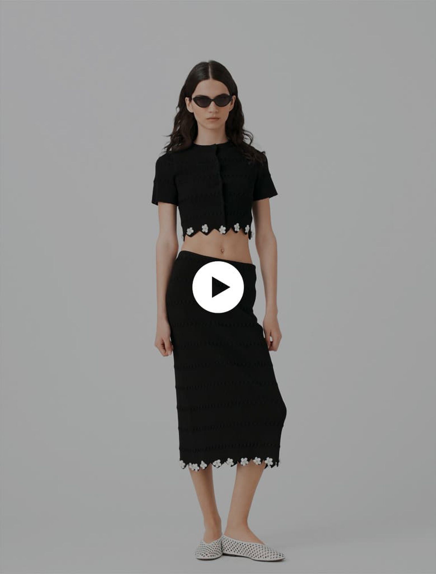 Knit skirt with jewelled flowers