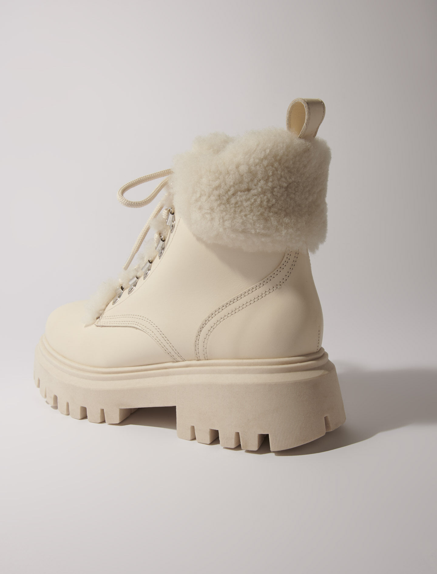 Chunky faux fur boots - Offline_Shoes | Maje