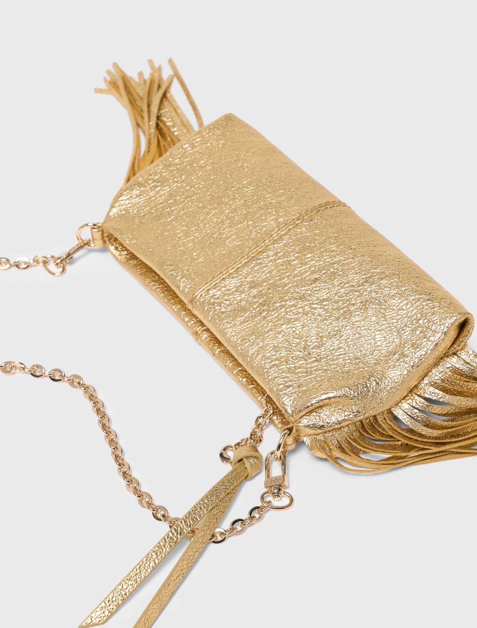 Metallic Miss M clutch bag