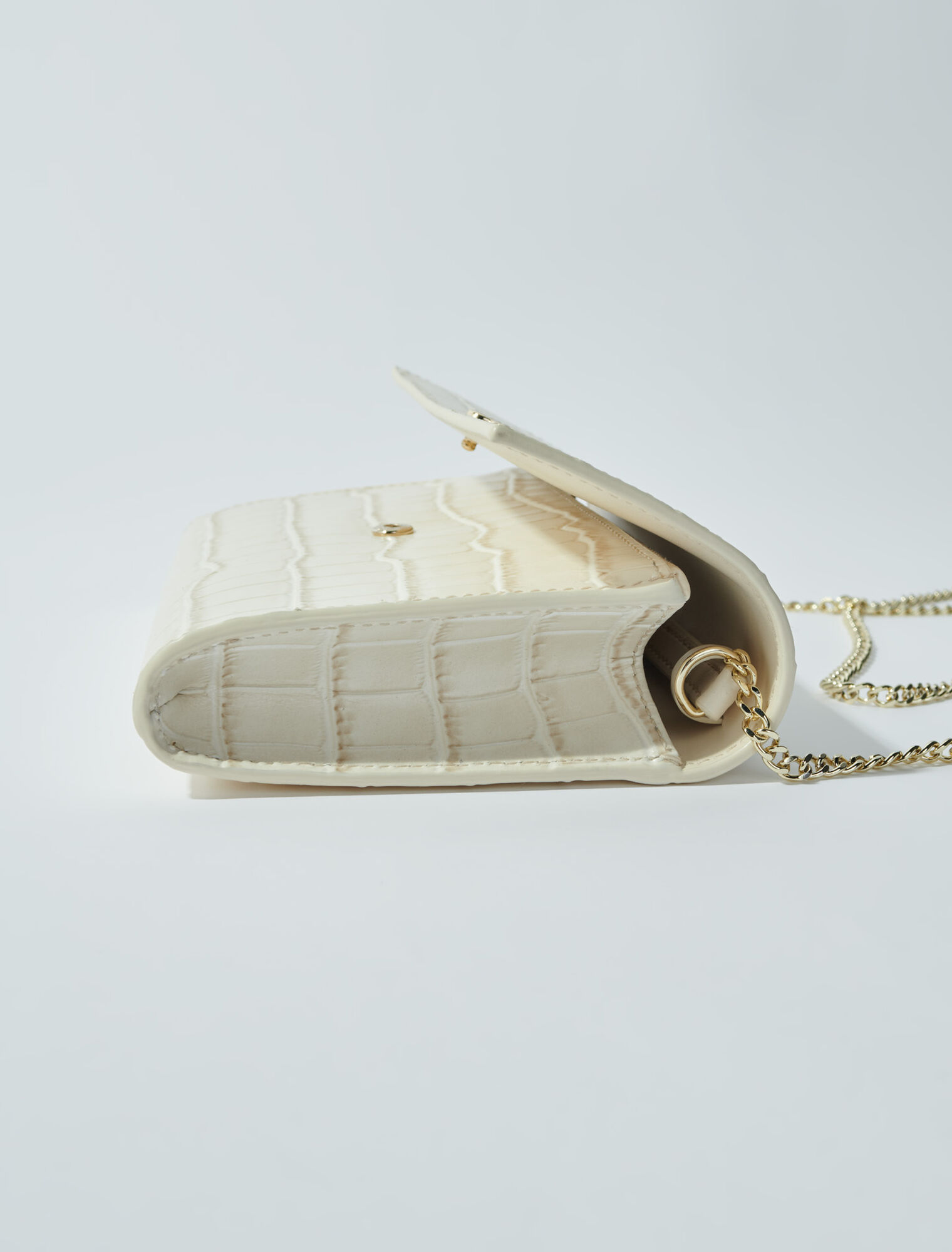 Croc-effect embossed leather bag
