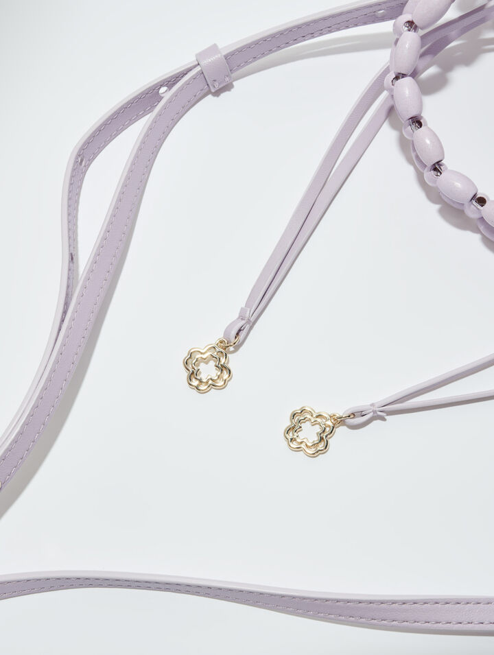 Bucket bag embellished with beads