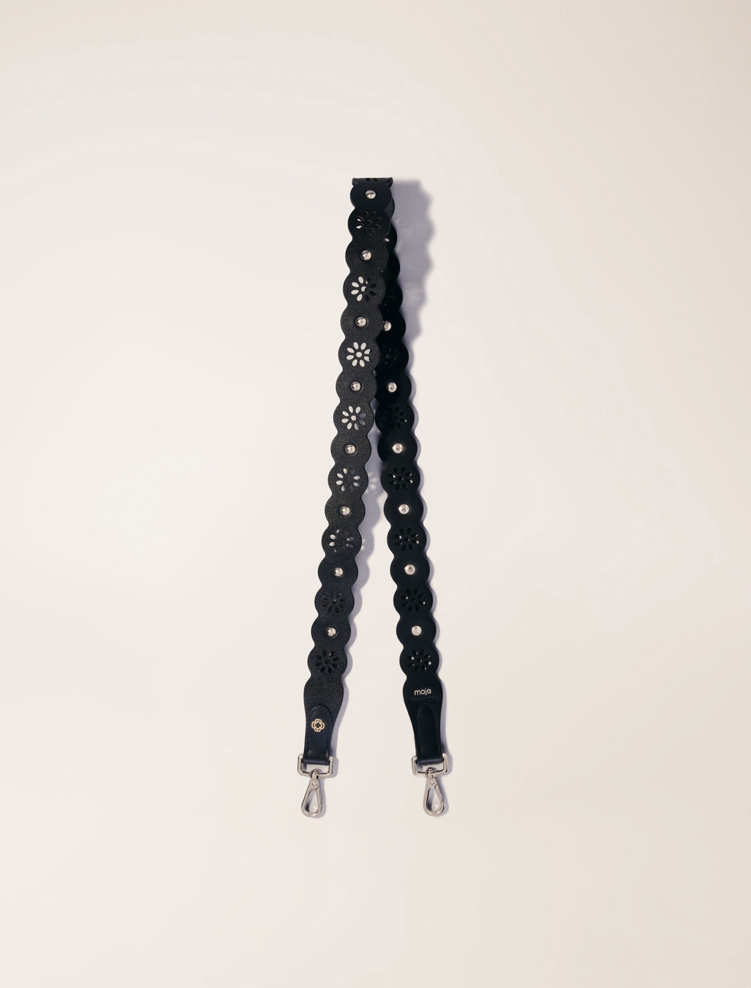 Perforated flower-style strap