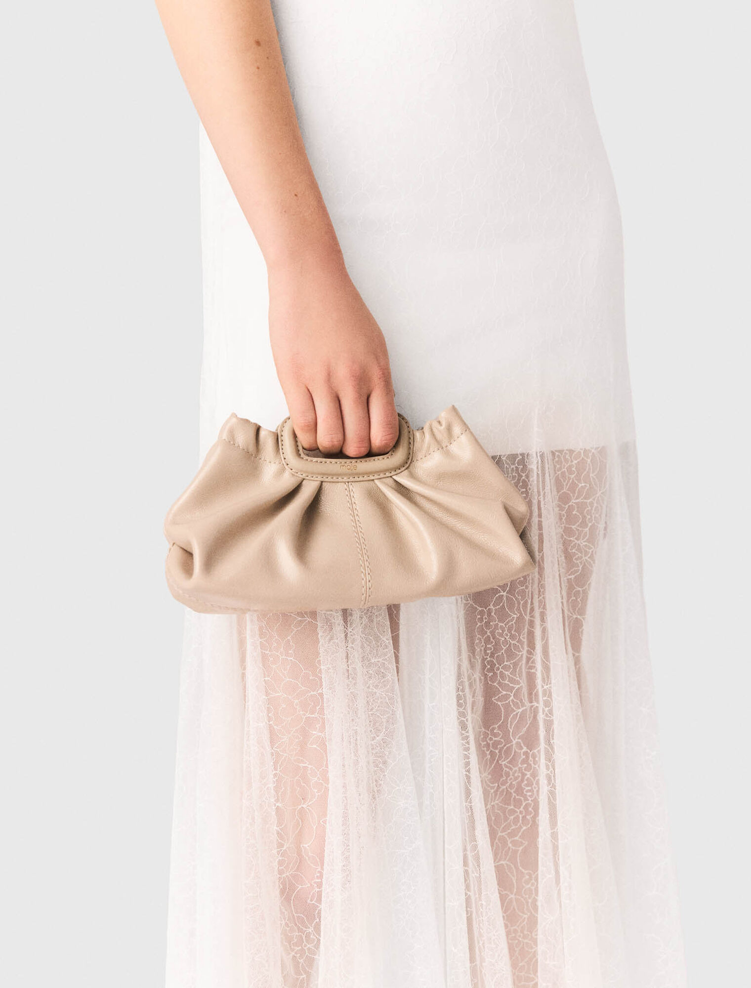 Mini naplak leather clutch