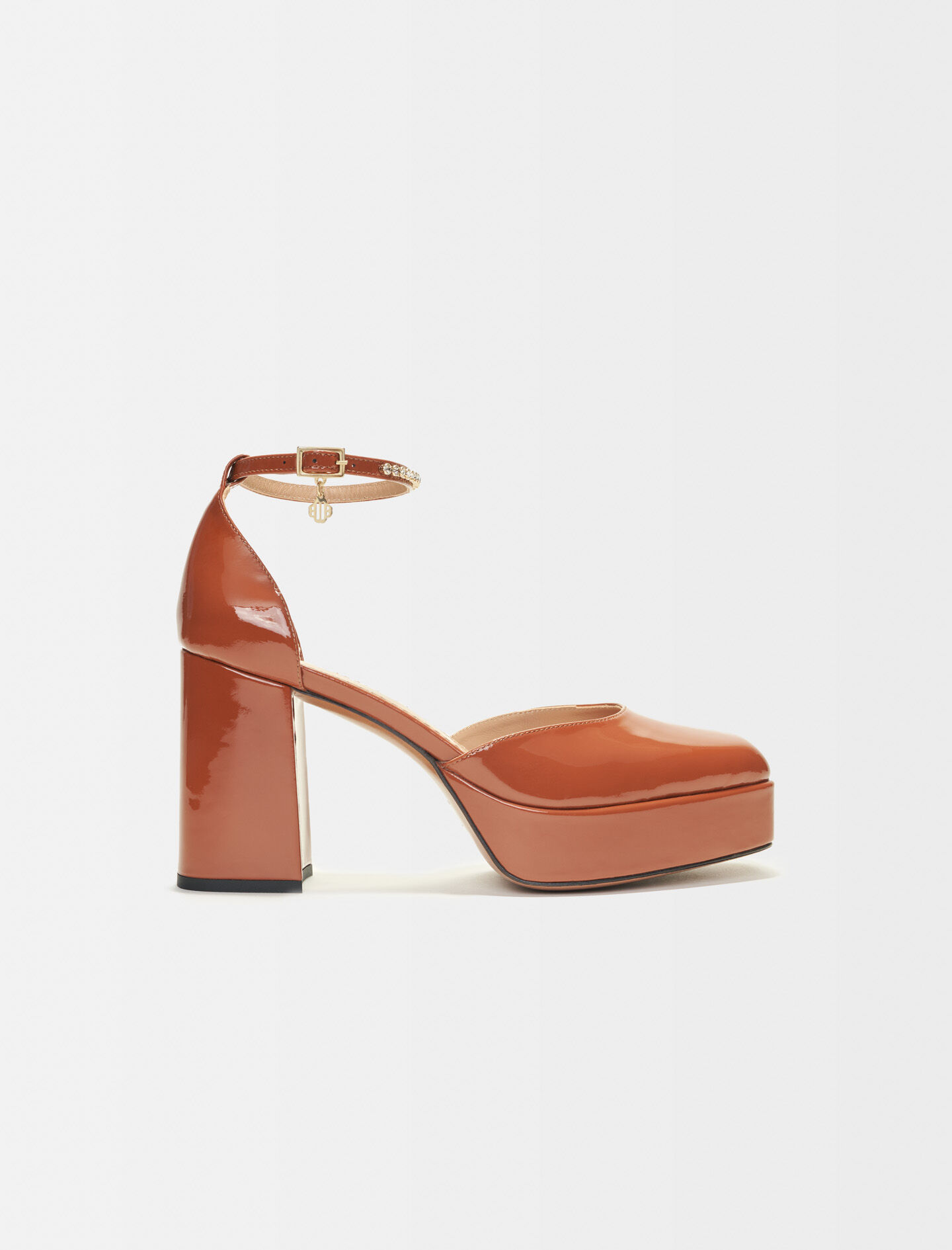 Patent platform pumps Offline Shoes Maje