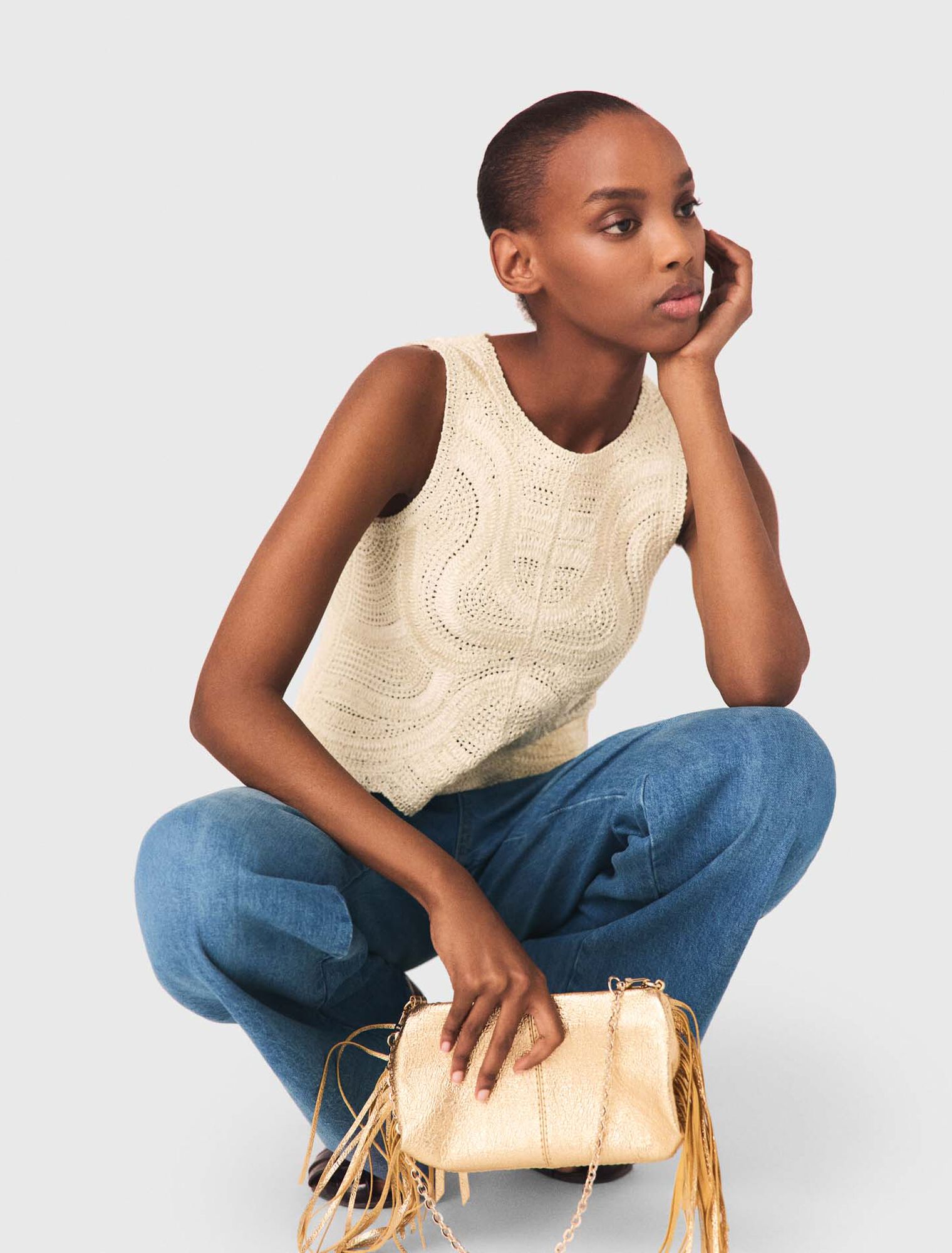 Sleeveless crochet-knit top