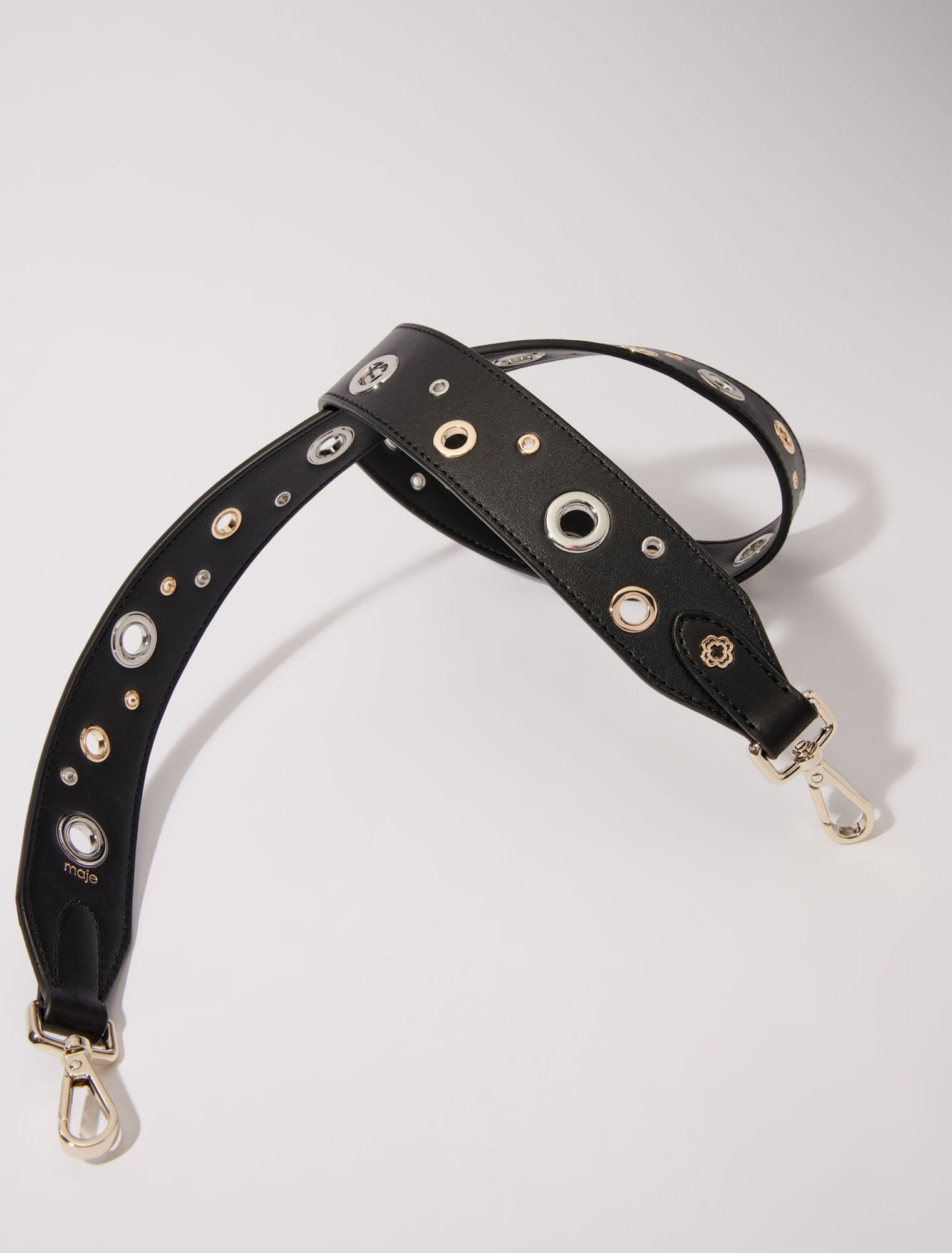 Leather shoulder strap with eyelets