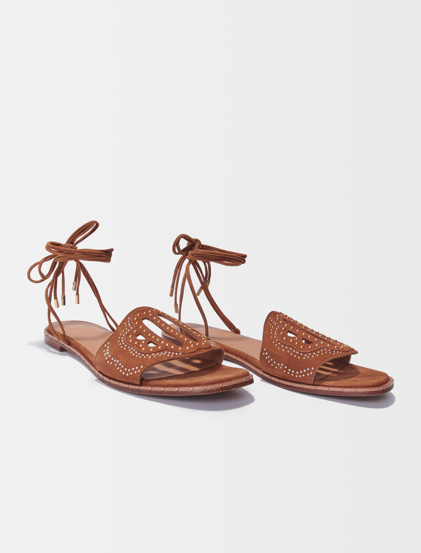 Flat studded sandals