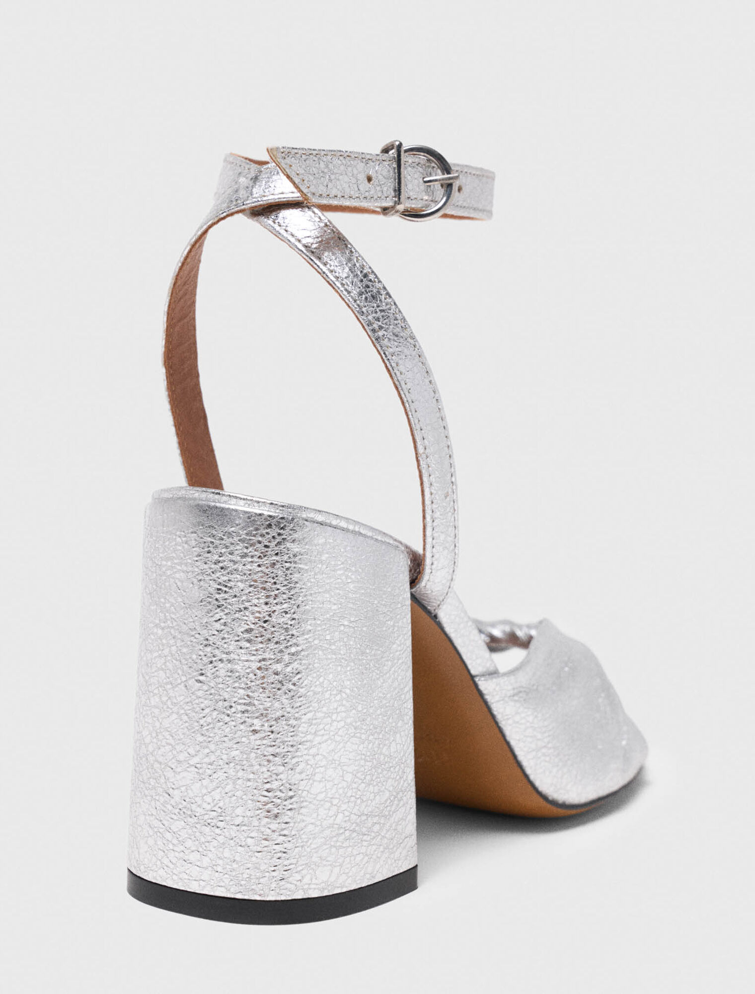 Metallic leather sandals with heels