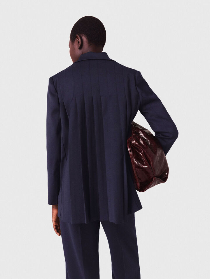 Suit jacket with pleated back