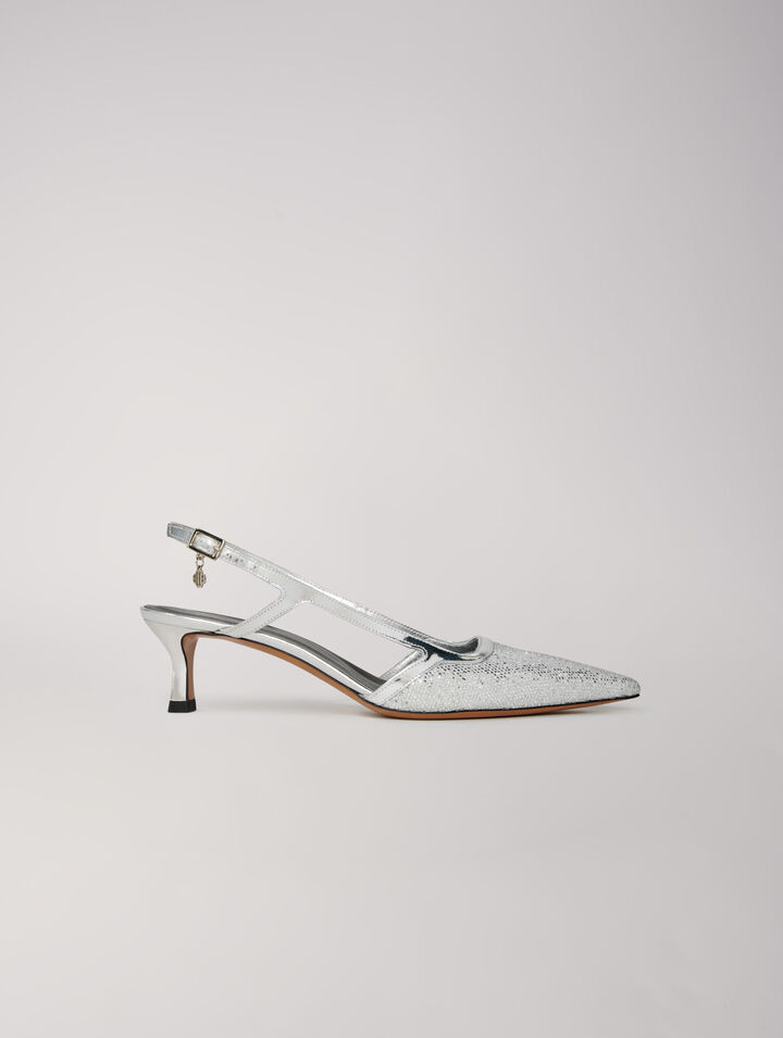 Pointed silver pumps